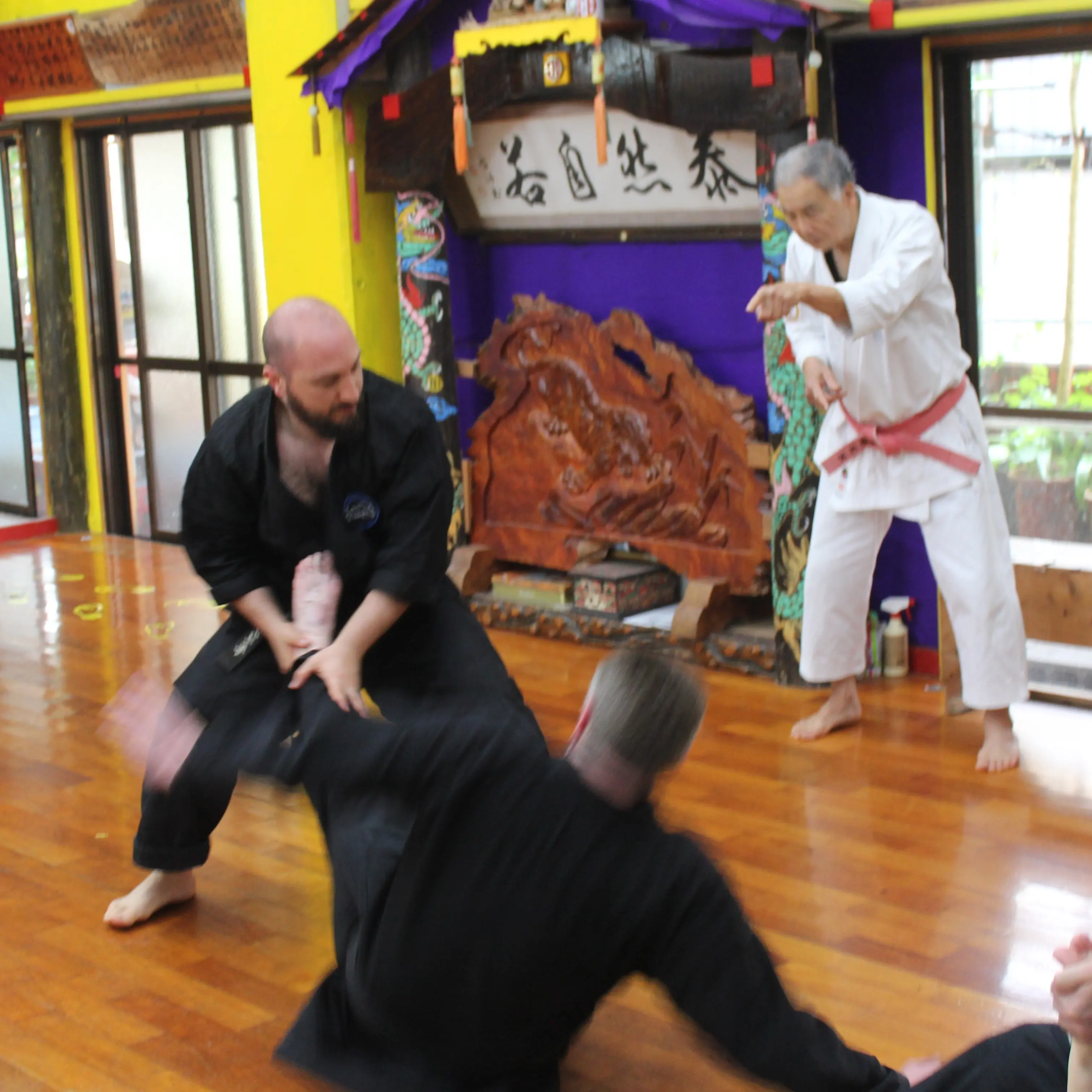 Olgun Tiltay in Okinawa learning takedowns from Tetsuhiro Hokama Sensei [10th Dan] Gojuryu Karate